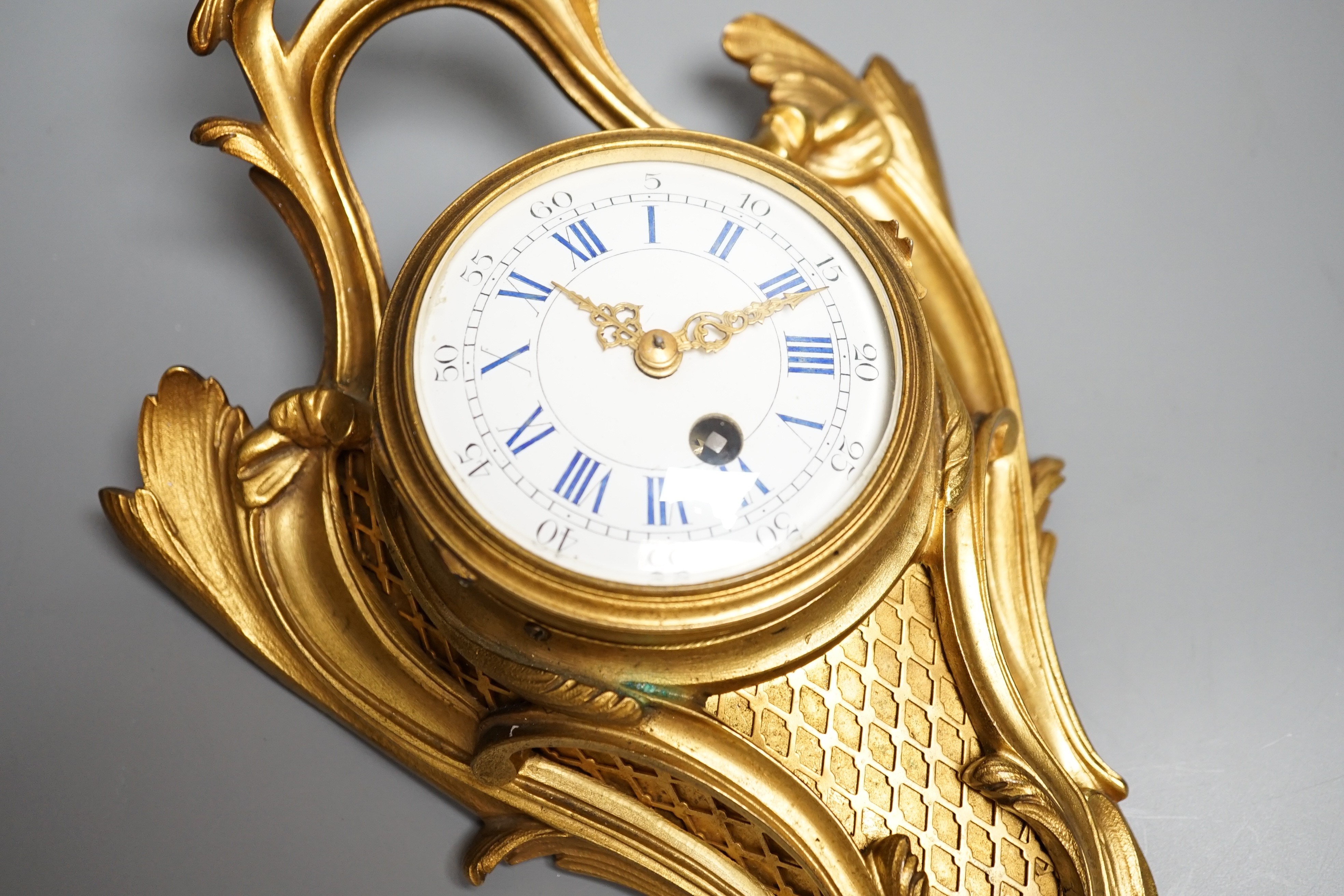 A 19th century French eight day ormolu cartel timepiece, height 29cm